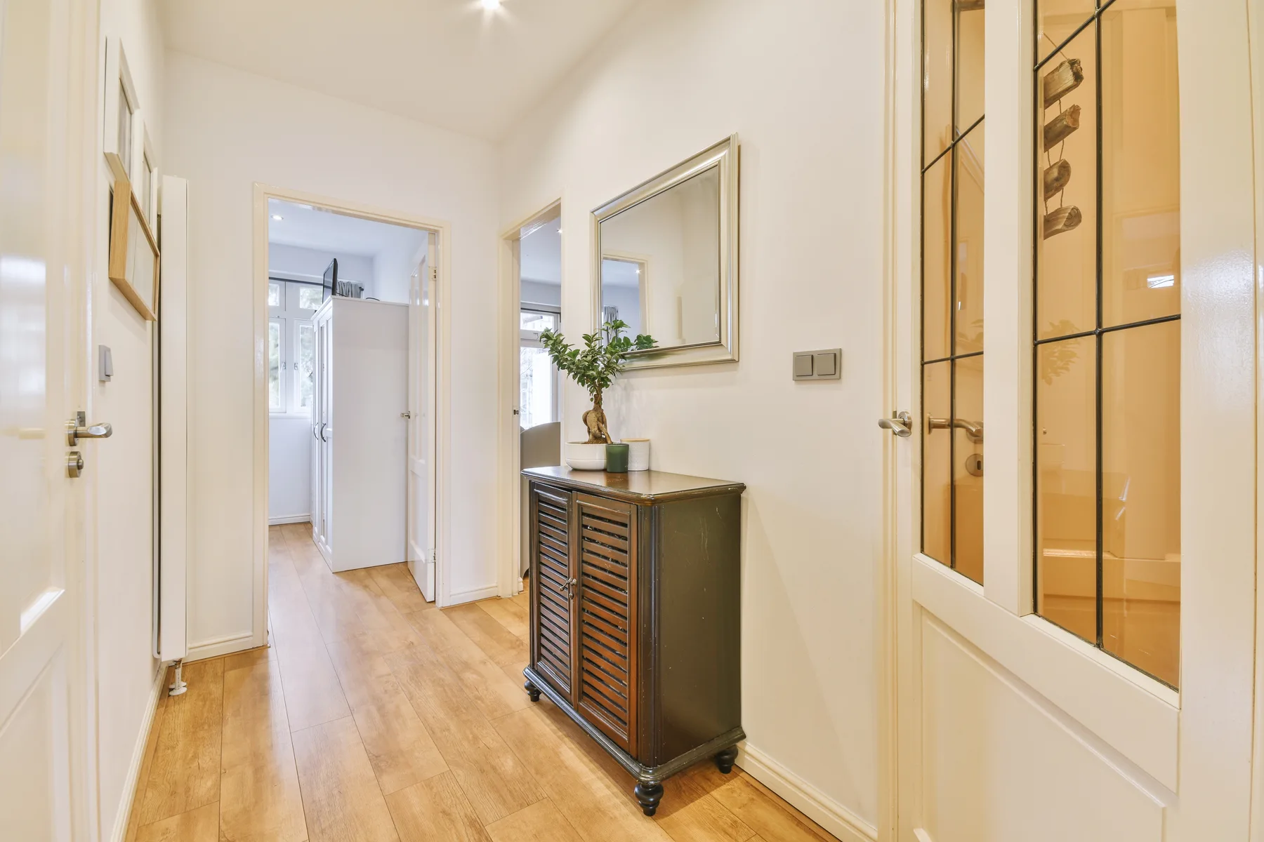 DOORWAY-OF-MODERN-APARTMENT-WITH-WHITE-WALLS-AND-P-2023-11-27-05-05-52-UTC