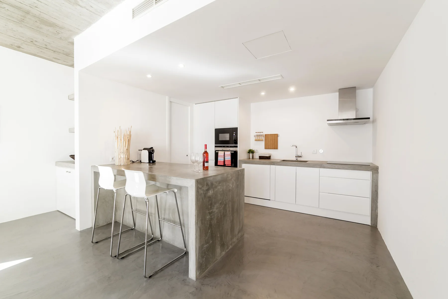 MODERN-KITCHEN-WITH-GRAY-TILE-FLOOR-AND-WHITE-WALL-2024-10-17-11-54-29-UTC