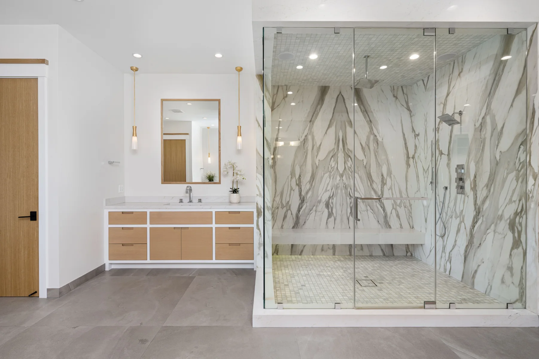 THE-BATHROOM-FEATURES-LARGE-MARBLE-SHOWER-AND-WOOD-2024-04-22-17-21-42-UTC