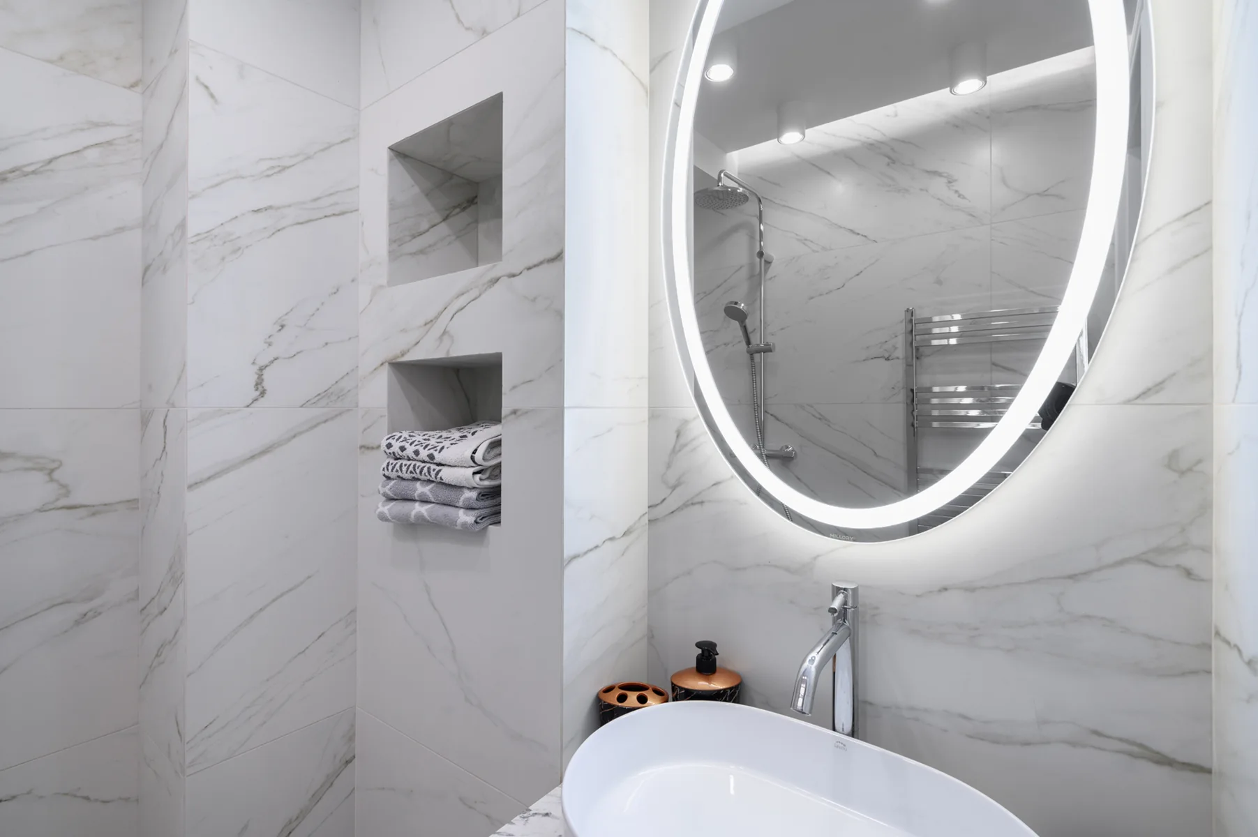 WHITE-BATHROOM-INTERIOR-WITH-MARBLE-TILES-ON-THE-W-2024-10-18-07-16-49-UTC